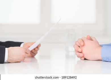 Interview. Close-up of two businesswoman around the table during job interview