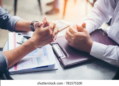 Interview Or Dialogue Between Businessman. Negotiation Of Two Businessman With Clasped Hands In Office.