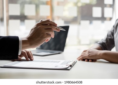 Interview employee talking about resume and job description with job applicants sitting in front in the office, Job applications concepts. - Shutterstock ID 1980664508
