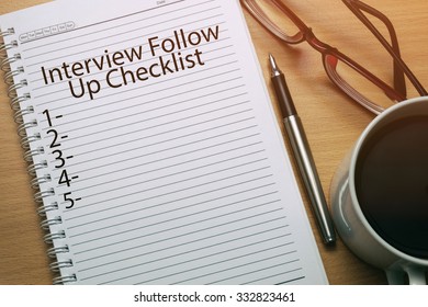  Interview Follow Up Checklist Written On Notebook - Business Conceptual