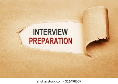 Interview Preparation Written Behind Torn Paper