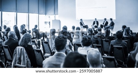 Interview and round table discussion at business convention and presentation. Audience at the conference hall. Business and entrepreneurship symposium.