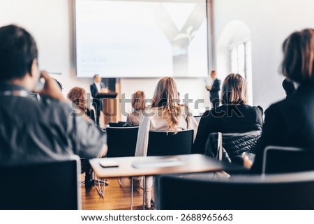 Interview and round table discussion at business convention and presentation. Audience at the conference hall. Business and entrepreneurship symposium.