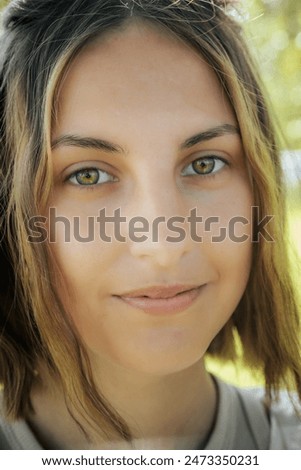 Similar – Portrait of a beautiful young woman outdoor smiling