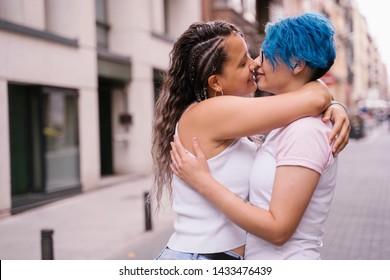 Intimate moment between a lesbian couple. - Powered by Shutterstock