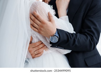 Intimate Moment of a Newlywed Couple Embracing with Elegance. - Powered by Shutterstock