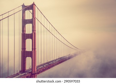 Into The Fog. San Francisco Golden Gate Bridge Foggy Scenery.