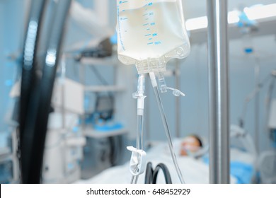 Intravenous System Dripping To The Patient In ICU.