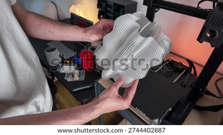 Intricate 3D printed shell in artisans hands, embodying Futurism and Pi Day, pioneers digital craftsmanship, tech wizardry