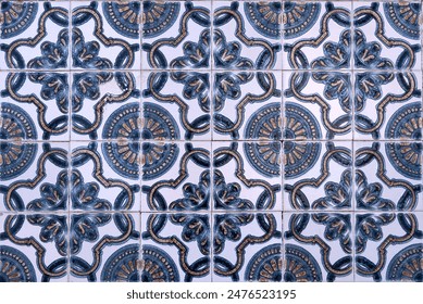 Intricate blue floral motifs on white tiles, reflecting art and culture - Powered by Shutterstock