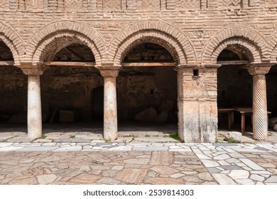 Intricate details of Church of Saint Sophia, a historic Byzantine church located in Ohrid, North Macedonia. Distinctive brickwork and row of arched window offering glimpse of architectural grandeur - Powered by Shutterstock