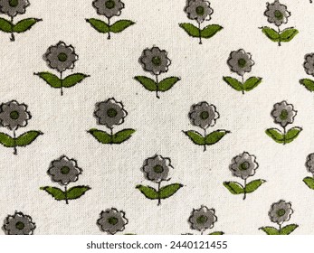 Intricate floral block printed butti in grey and green color on off white cotton fabric - Powered by Shutterstock