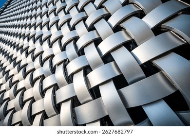 Intricate Patterns of Light and Shadow in Modern Metal Weaving Design  