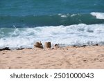 Intricate Sandcastle Built on Beach