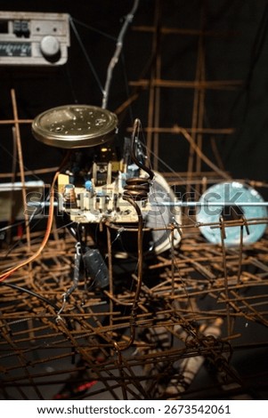 Intricate Technological Assemblage. A Creative Sculpture of Metal and Electronics.