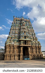 Intricately Carved, Colorful Gopuram Of Ancient Algar Koil Vishnu Kallazhagar Temple With Nice Blue Sky Background In Madurai, India.