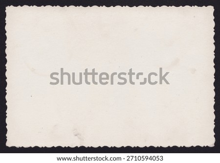 An intriguing texture of antique slightly soiled paper with ornately cut edges. Authentic vintage paper with a unique texture. The noble beauty of natural time-darkened old paper from the 1960s-1970s.