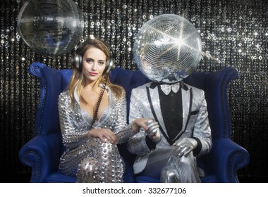 introducing mr and mrs discoball. two cool club characters dance and pose in a nightclub setting