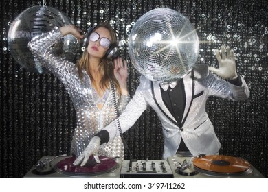 introducing mr and mrs discoball. two cool club characters DJ in a nightclub setting 