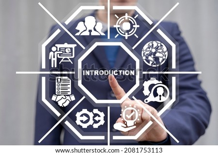 Introduction business concept. Businessman using virtual touchscreen clicks a introduction inscription.