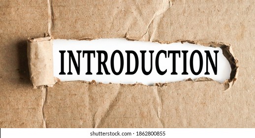 INTRODUCTION, text on white paper on torn paper background - Shutterstock ID 1862800855