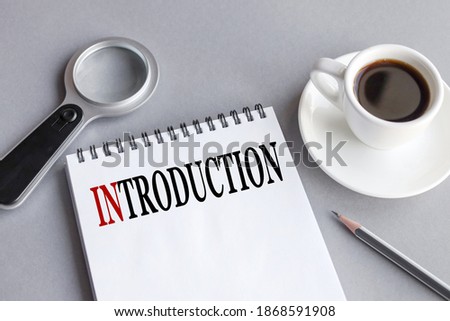 introduction, text on white paper on gray background