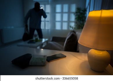 intrusion of a burglar in a house inhabited - Shutterstock ID 336655058