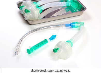 Intubation Tube With Filter In A Metal Tray With An X-ray Image