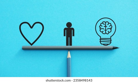 Intuition versus Logic or the common sense are shown using a pictures of the heart and the lamp with brain. Emotion or logic