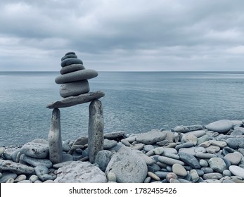 Inukshuk Stone Statue On Agate Beach - Culture Of Indigenous Of Canada  