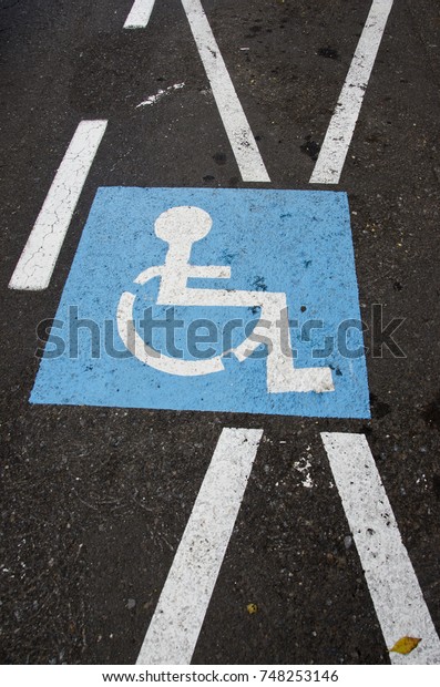 Invalid parking place
sign on asphalt road