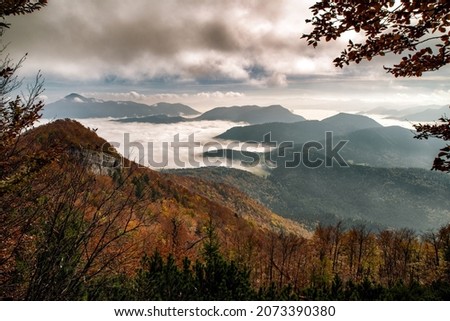 Inversion on mountains. Autumn forest and clouds under the hill Sip in SLovakia