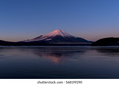 an inverted image of mt. fuji