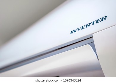 Inverter Air conditioner technology for fresh air breathing and globe healing concept install on modern grey wall colors interior design for urban business office and money saving 