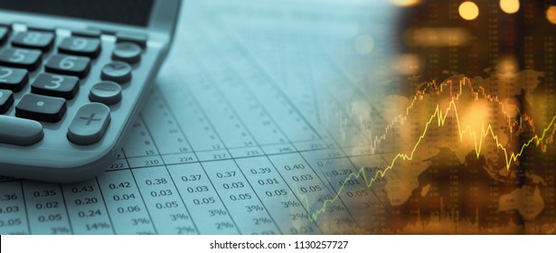 invest financing banking concept. business report of return on investment and calcualtor with graph index stockmarket on board.
