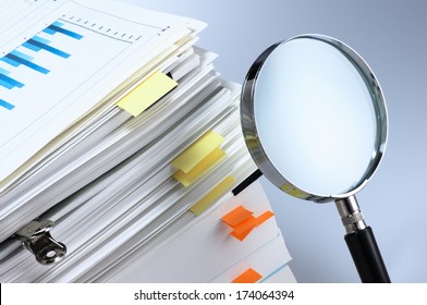 Investigate And Analyze. Scanning Business Documents. Magnifying Glass And Stack Of Documents. 