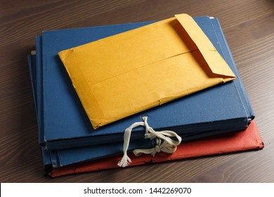 Investigator Desk With Yellow Envelope, Vintage Documents, Folders.