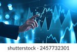 Investing and stock market concept. A businessman checks financial data charts for trading forex, stocks, money, and digital assets. business finance, technology, and investment.