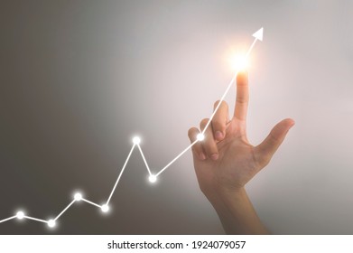 Investment And Economic Growth Concept, Hand Pointing Of Businesswoman With Financial Symbols 