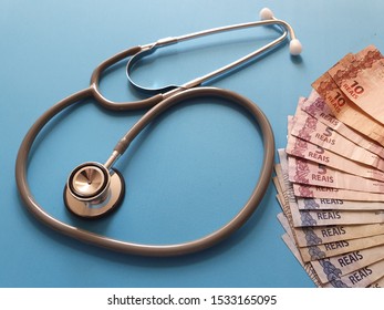 Investment In Health Care, Brazilian Money And Stethoscope For Medical Check