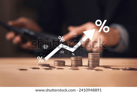 Investment in percentage with coin. income tax paid, dividends, interest rate and corporations. Businessman calculating with calculator, of return on financial research, report.