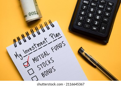 Investment Plan Personal Preference Concept. Mutual Funds Checkbox Marking Survey With Calculator And Indian Currency Banknotes.
