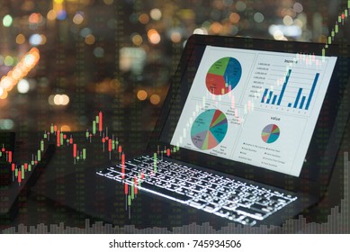 investment portfolio on screen laptop computer with index stock market and chart with uptrend stock market graph.