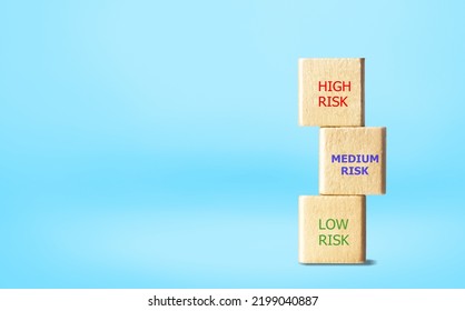 Investment Risk Management, Tolerance And Planning And Asset Allocation And Diversification Concept. Wooden Blocks On The Desk