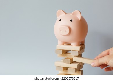 Investment risk and uncertainty in in financial sector. economic crisis, destroying or supporting business with money. - Shutterstock ID 2203578317