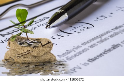 Investment Valuation Concept.Double Exposure Of Sprout Growing From Coins In Money Bag And Pen On Discount Cash Flow Model Background.