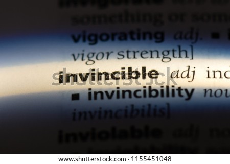 invincible word in a dictionary. invincible concept.