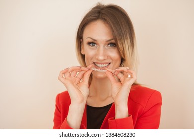 Invisible braces aligner, woman smiling