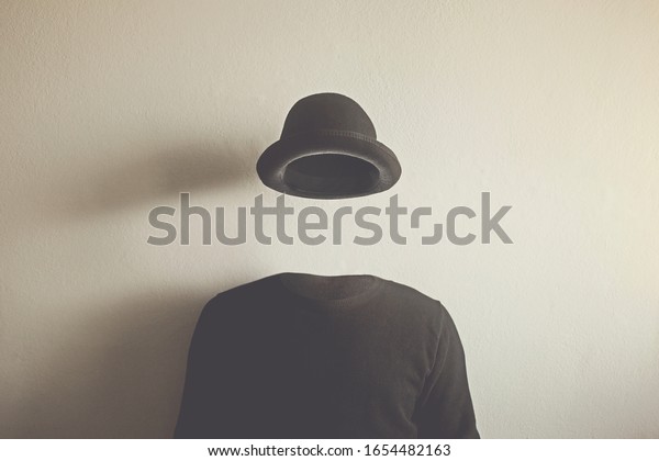 invisible man wearing black bowler, surreal\
concept of absence of\
identity