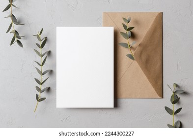 Invitation or blank greeting card mockup with eucalyptus twigs and envelope, botanical card with copy space - Shutterstock ID 2244300227